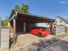 Gepflegtes Einfamilienhaus mit 707 m² Grundstück, Wintergarten, Doppelgarage & Carport - Doppelgarage und Carport